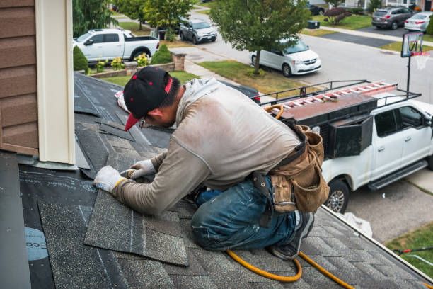 Professional Gutter Installation technician working in Midland, MI